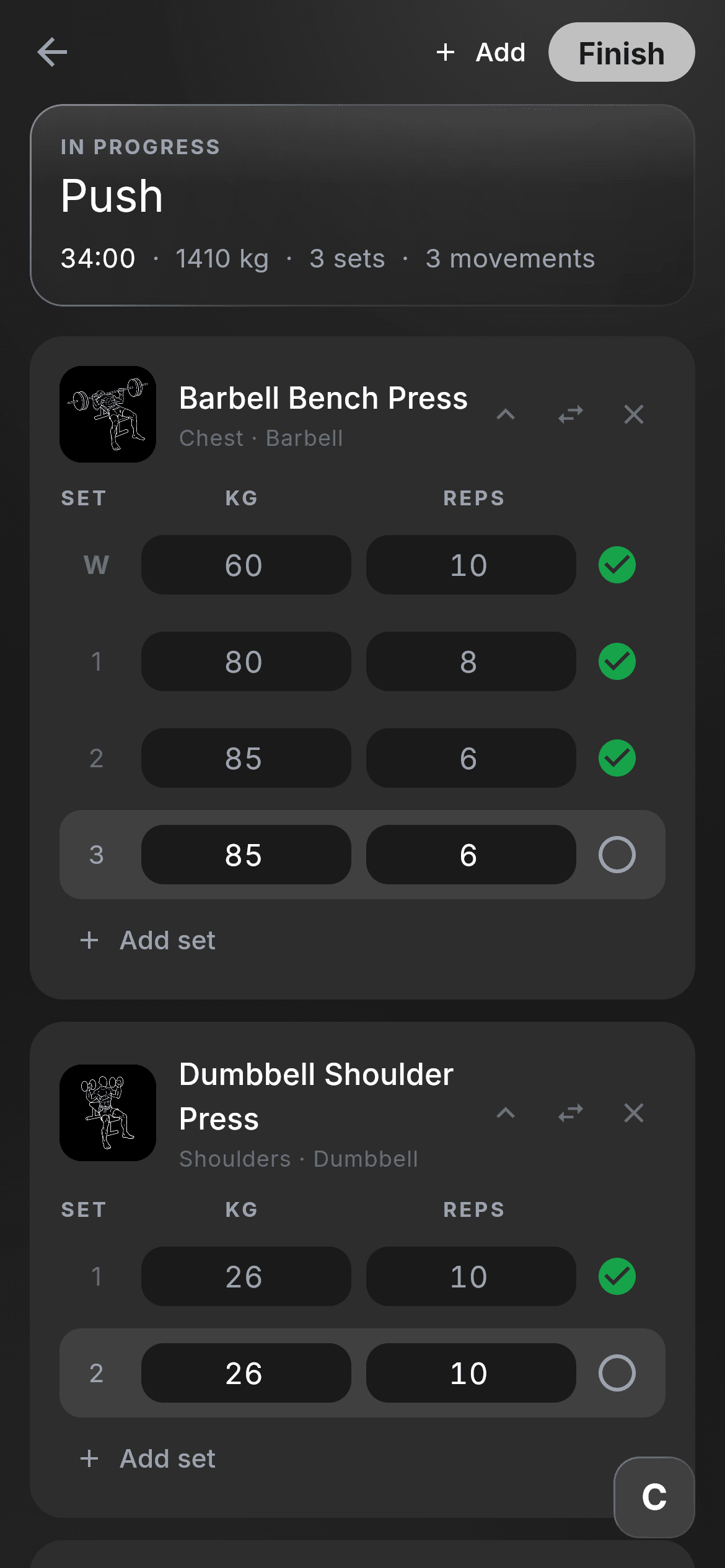 Lift during a session: sets of bench press ticked off, the next one filled in.